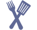 A fork and spatula in an X formation.